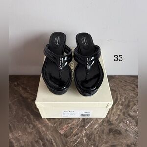 Coach Nella Patent Black Wedge Sandals. Brand New and Original Packaging.